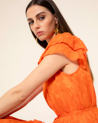 Foto representativa de vestido naranja corto volantes flora