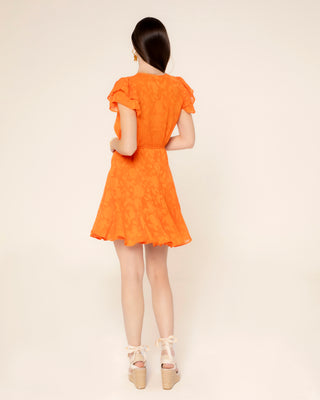 Fotografía destacada de vestido naranja corto volantes flora